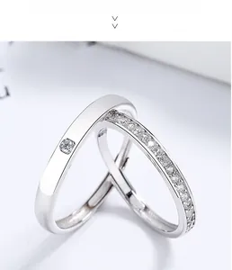Detailed macro view of 925 sterling silver couple rings with adjustable open bands