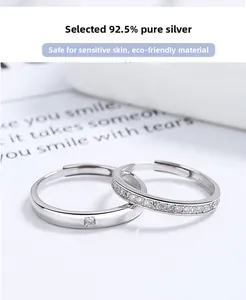 Detailed macro view of 925 sterling silver couple rings set with cubic zirconia stones