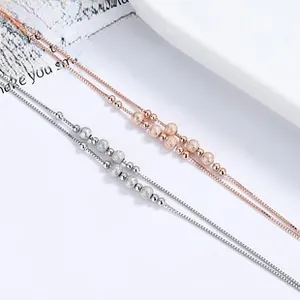 Detail of 925 sterling silver box chain bracelet with mirror and stardust beads