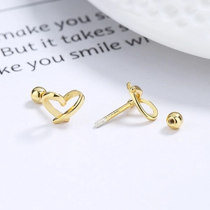 Elegant 925 sterling silver hollow heart screw back earrings with polished gold finish