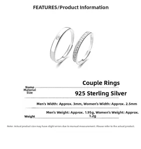 Detail view of 925 sterling silver couple rings showing S925 hallmark and polished finish