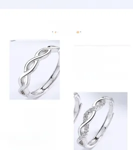 Detail view of 925 sterling silver couple rings showing S925 hallmark and woven texture