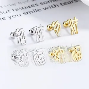 Detailed view of 925 sterling silver studs with Chinese characters Cai and Fu