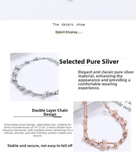 Detailed view of double-layer 925 sterling silver bracelet with frosted beads and extension chain