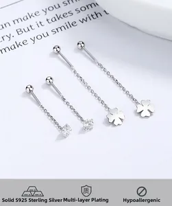 Close-up of S925 silver four-leaf clover earrings with long chain tassels and zircon