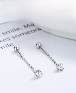 Detail of 925 sterling silver four-leaf clover tassel earrings with cubic zirconia