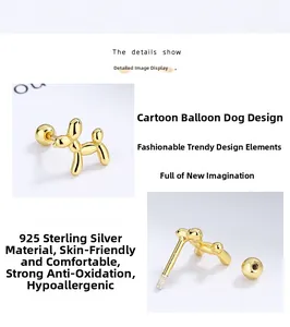 Macro detail of gold 925 sterling silver balloon dog stud earrings with screw back design