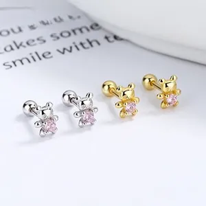 Close-up of 925 sterling silver bear stud earrings with pink crystal and screw backs