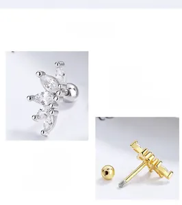 Macro detail of 925 silver marquise zircon stud earrings with ball screw back closure