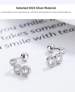 Detailed view of S925 silver stud earrings with triple zircon and threaded screw back