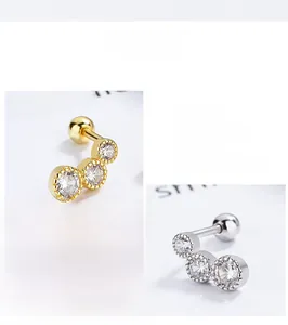 Macro detail of S925 sterling silver screw-back earrings with cubic zirconia stones