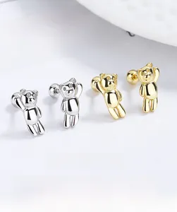 Macro detail of S925 sterling silver bear stud earrings with secure screw-back design