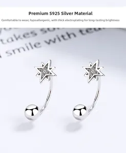Macro detail of S925 sterling silver star earrings with pave-set sparkling zircon stones