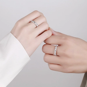 925 silver couples ring set with matte finish and antler design on gray background