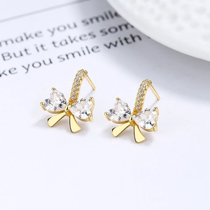 Boucles d'oreilles nœud en argent 925 avec zircons en forme de cœur et plaquage or