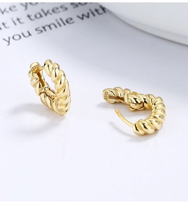 Detail of twisted rope gold earrings showing the S925 sterling silver hallmark stamp