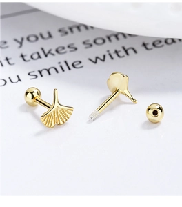 Macro shot of 925 sterling silver ginkgo leaf studs with secure screw ball backing