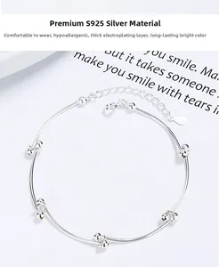Detailed view of S925 sterling silver bead bracelet with polished finish and adjustable chain
