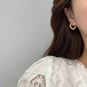 Classic 925 sterling silver twisted rope hoop earrings with a shiny 18K gold finish