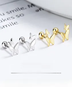 Detail of silver and gold butterfly screw back earrings in 925 sterling silver