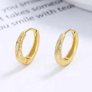 Minimalist matte gold sterling silver hoop earrings with elegant wide flat texture