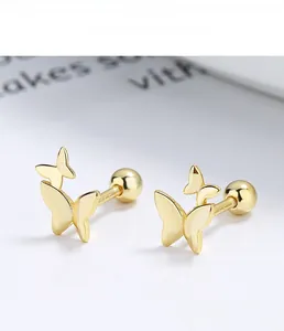 Detailed close-up of S925 sterling silver butterfly stud earrings with gold plating