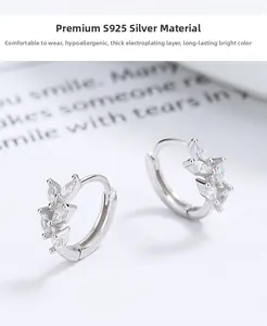 Macro shot of S925 sterling silver leaf earrings featuring marquise-cut clear zircons