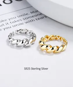 Detailed view of S925 sterling silver twisted rope rings in gold and silver finishes