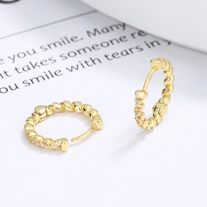 925 silver twist hoop earrings with gold plating and paved white zircon stones