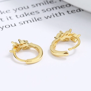 Elegant 925 sterling silver leaf earrings with gold finish and sparkling zircon stones