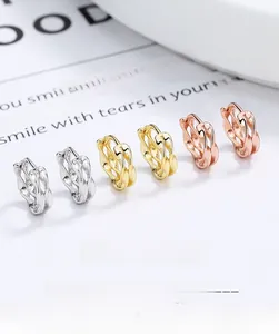 Detailed view of S925 sterling silver Mobius earrings in silver, gold, and rose gold