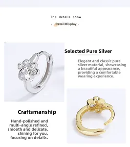 Vue détaillée de boucles d'oreilles pattes de chat en argent sterling et zircon