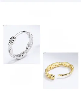 Detailed view of S925 sterling silver chain link earrings in silver and gold finishes