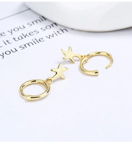 Close-up of S925 sterling silver hallmark on gold-plated starfish hoop earrings