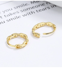Macro detail showing the S925 hallmark on the gold plated hollow chain link hoop earrings
