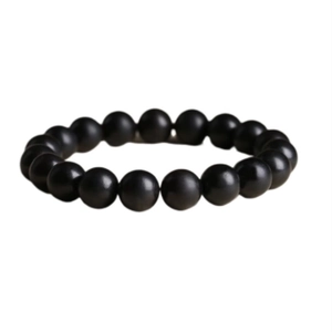 Minimalist black round bead bracelet for men with vintage style and polished finish