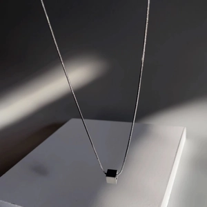 Minimalist silver cube pendant necklace with sleek snake chain for men and women