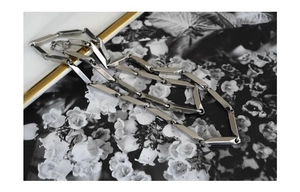 Detailed view of silver titanium steel long bar link chain necklace for men with glossy finish