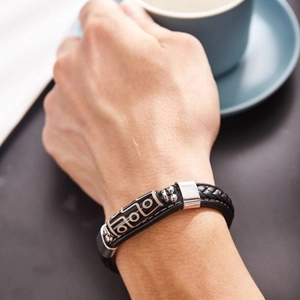 Bracelet tressé en cuir noir pour homme avec motif d'œil tibétain de style ethnique