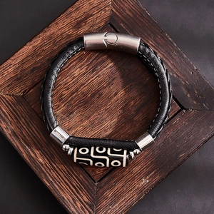 Bracelet tibétain en perles dZi à neuf yeux avec cuir tressé noir et fermoir magnétique