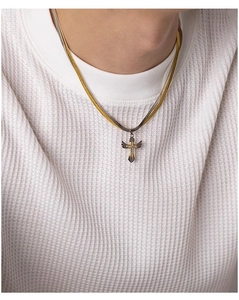 Detailed view of layered two-tone cross pendant on snake chains for men style