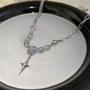 Starry cross moonstone necklace featuring asymmetrical paperclip and regular link chain