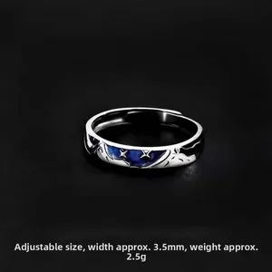 Detail of adjustable star pattern ring, 3.5mm width silver band with blue enamel