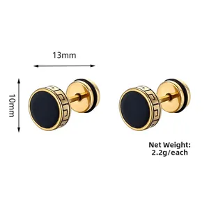 Detail of 13mm gold barbell earring showing meander engraving and black panel texture