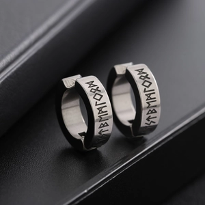 Punk style stainless steel clip-on earrings with engraved Nordic runes on silver bands