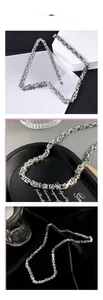 Detail of silver Byzantine chain necklace showing the stainless steel woven links