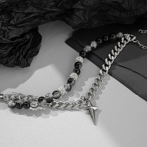 Star charm stainless steel layered bracelet with black beads and cracked ice crystal