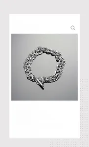 Detail view of silver double-layer titanium steel chain with industrial OT toggle clasp