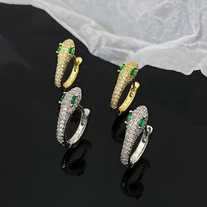 Boucles d'Oreilles Créoles Tête de Serpent en Cuivre de Luxe Micro-Incrustées de Strass Yeux Verts Bijoux de Mode