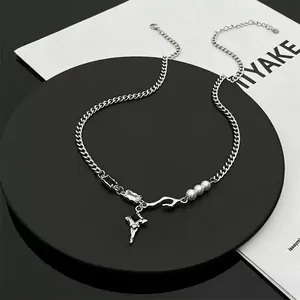 Minimalist silver titanium necklace with zircon star, black pendant and white pearls